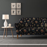 Velvet sofa upholstered in a dark, luxurious stain resistant velvet with whimsical design