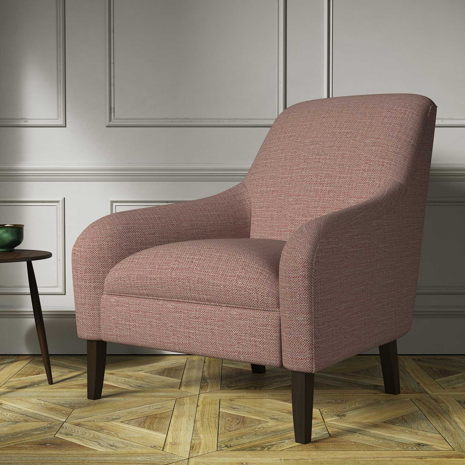 Chair covered in a woven fabric in a herringbone design in Roseberry