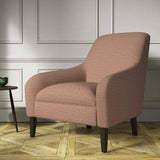 Chair covered in a woven fabric in a herringbone design in Ember
