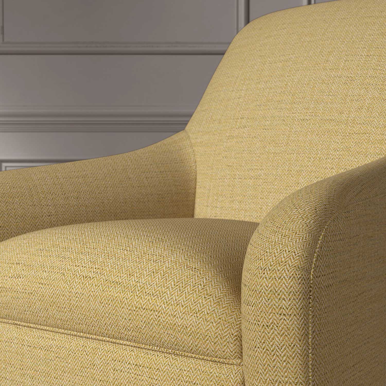 Close up of a chair covered in a woven fabric in a herringbone design in Saffron