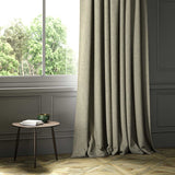 A grey woven fabric shown as a curtain.