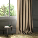 A brown woven fabric shown as a curtain.