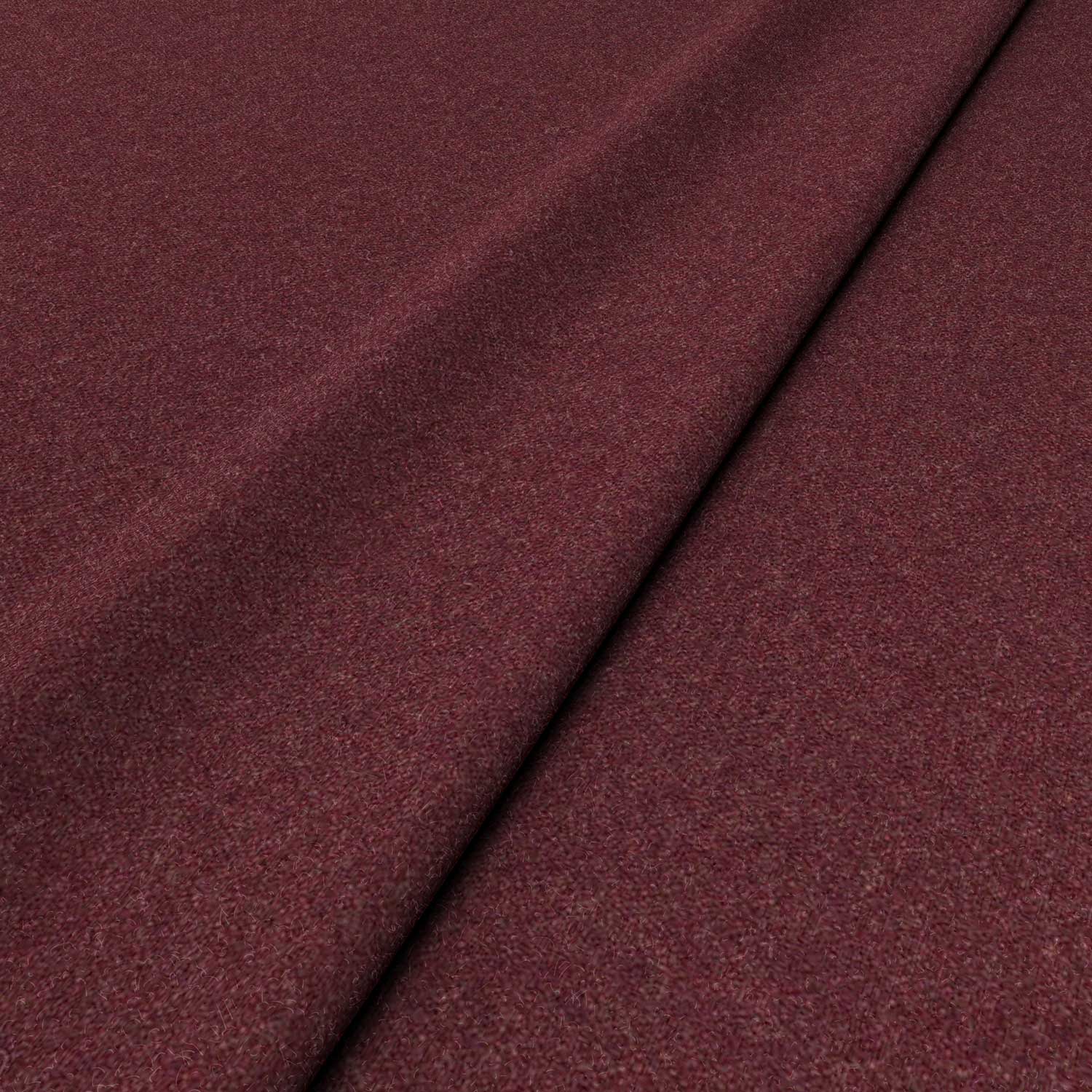 Sample of a red woven fabric in recycled wool.