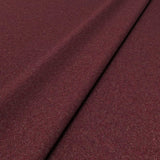 Sample of a red woven fabric in recycled wool.