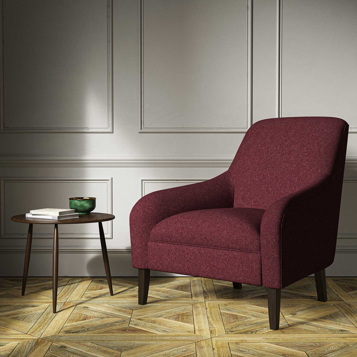 A red woven fabric on an armchair.