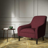 A red woven fabric on an armchair.