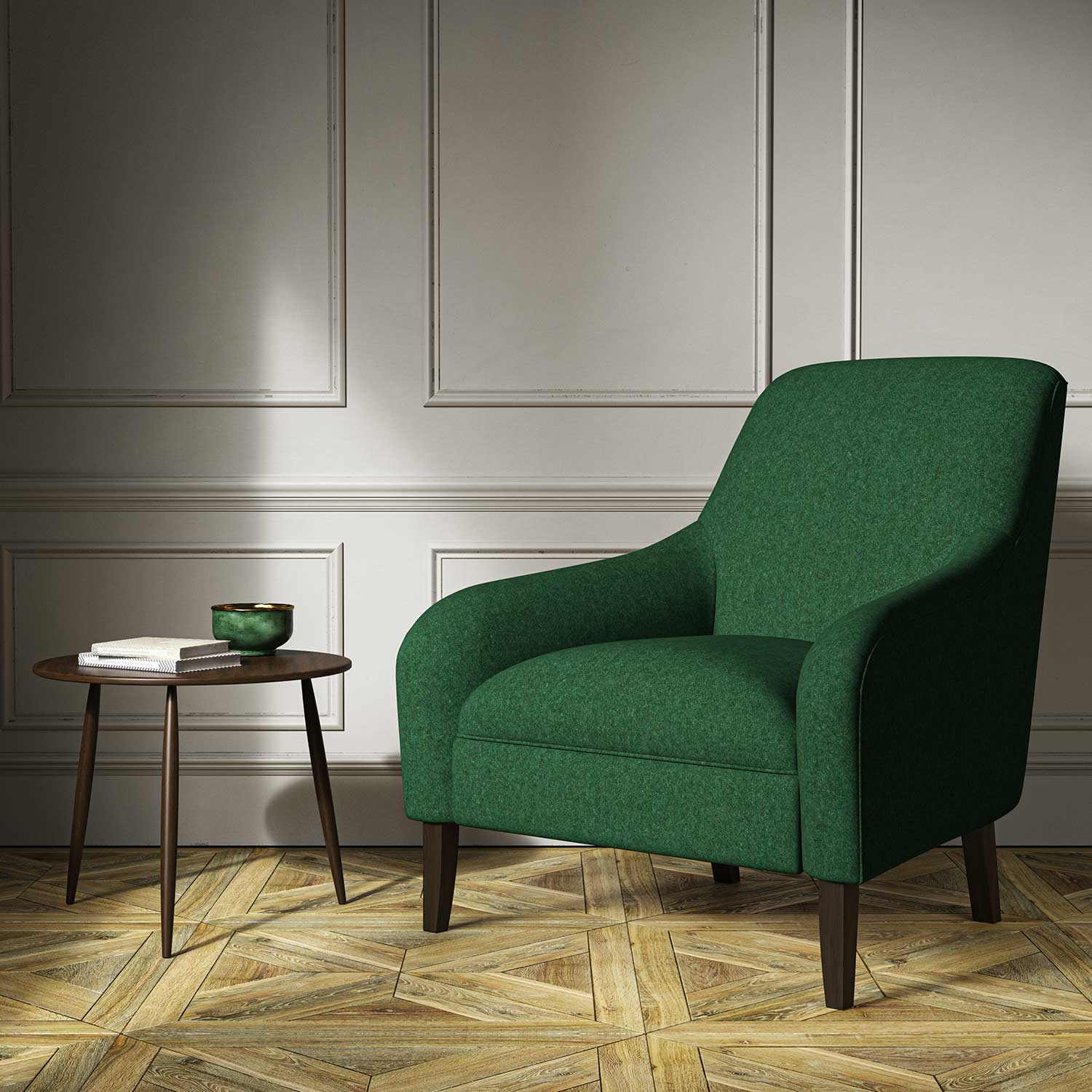 A green woven fabric on an armchair