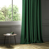 A green woven fabric shown as a curtain.