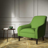 A green woven fabric on an armchair.