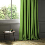 A green woven fabric shown as a curtain.