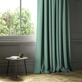 A blue woven fabric shown as a curtain.