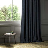 A blue woven fabric shown as a curtain.
