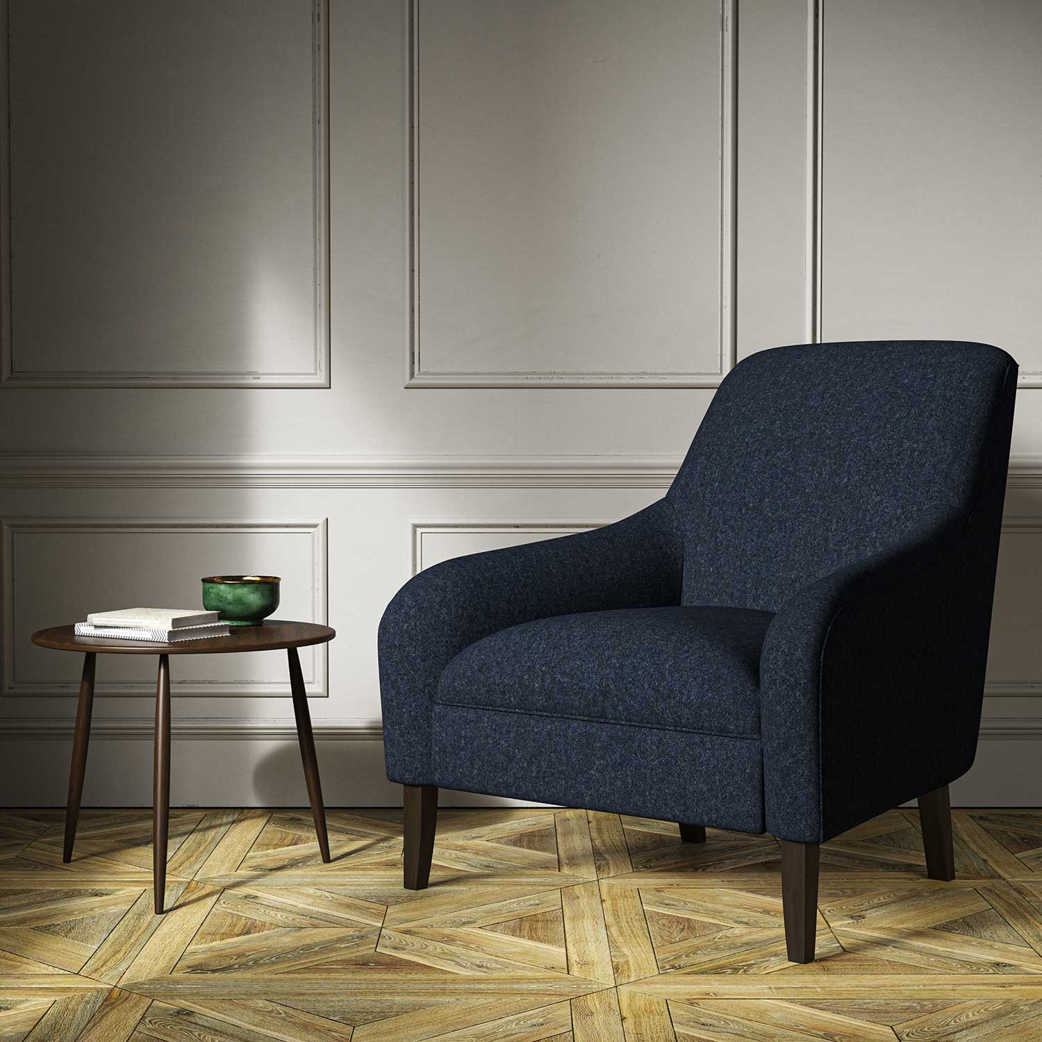 A blue woven fabric on an armchair.