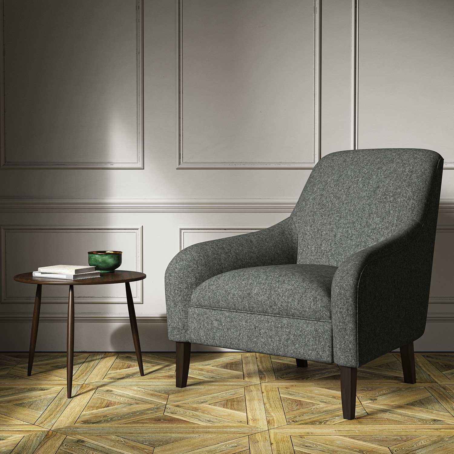 A grey woven fabric on an armchair.
