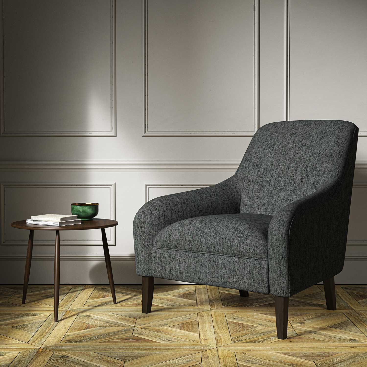 A grey woven fabric on an armchair.