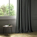 A grey woven fabric shown as a curtain.