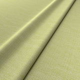 Fabric swatch of a green woven fabric for upholstery