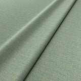 Fabric swatch of a plain turquoise weave fabric for upholstery