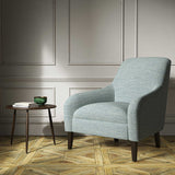 Chair upholstered in a plain blue weave fabric