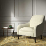 Armchair upholstered in a cream woven fabric