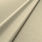 Fabric swatch of a cream woven fabric for upholstery