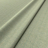 Fabric swatch of a green woven fabric for upholstery