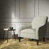 Armchair upholstered in a grey woven fabric