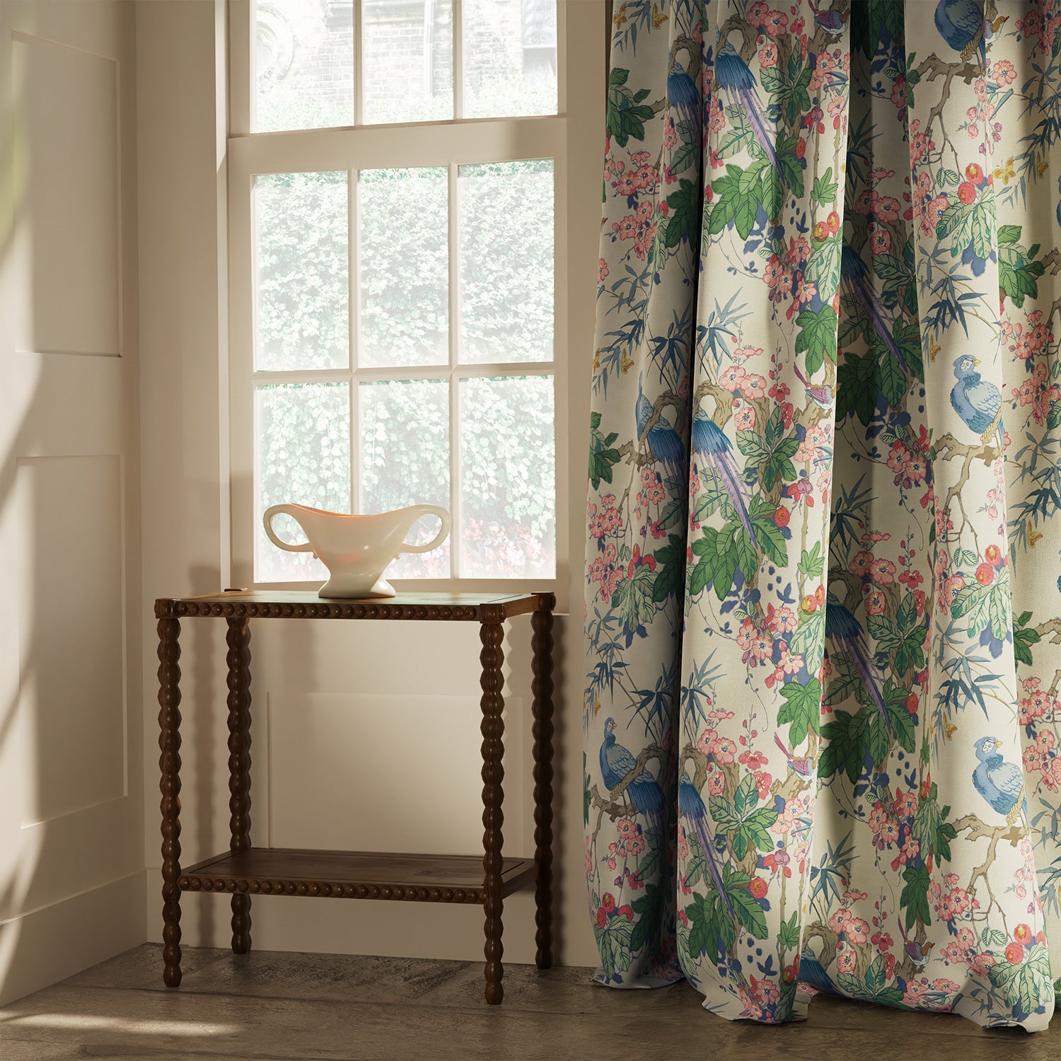 Curtain in a lively, tropical floral and bird linen fabric