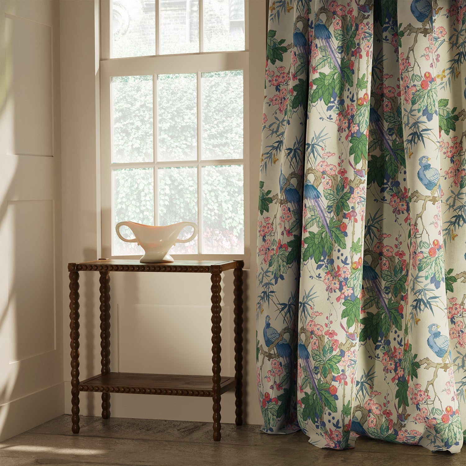 Curtain in a lively, tropical floral and bird linen fabric