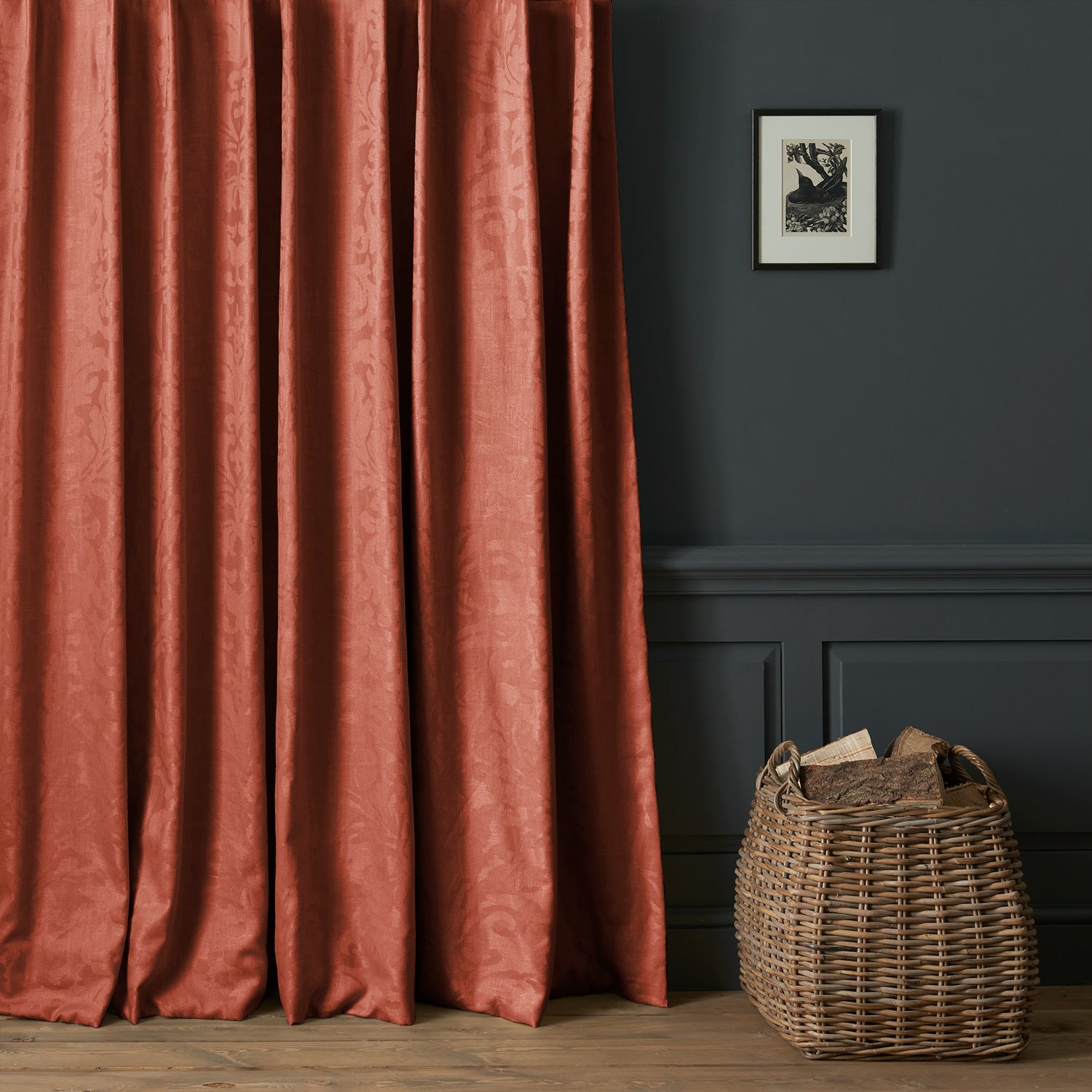 Curtains in a contemporary damask fabric in a red colour.