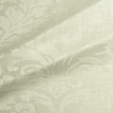Fabric swatch of a contemporary damask fabric in a light green colour for upholstery and curtains.