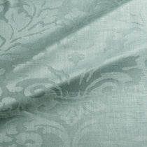 Fabric swatch of a contemporary damask fabric in a light blue colour for upholstery and curtains.