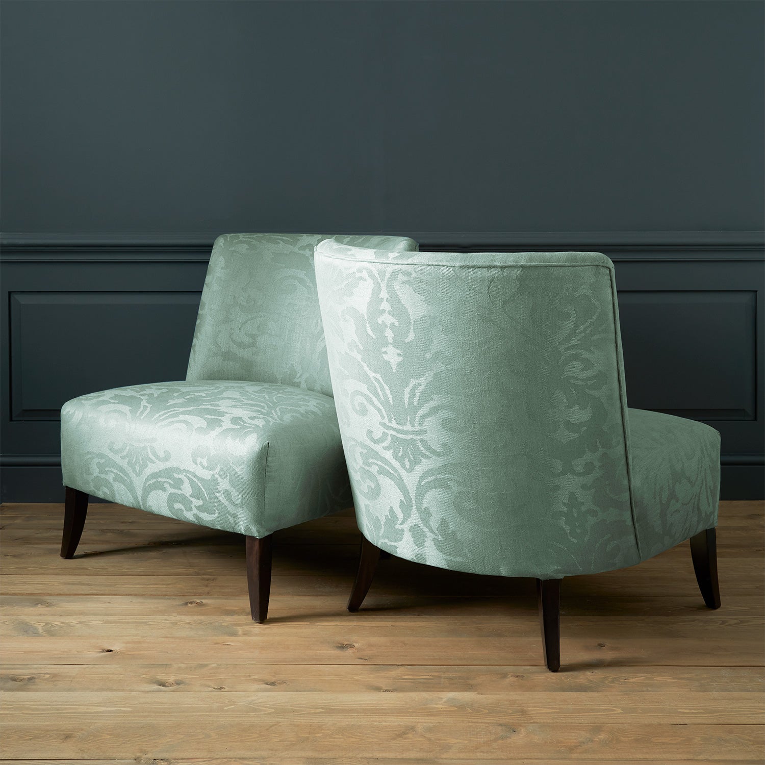 Armchairs in a contemporary damask fabric with light blue colours.