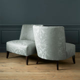 Armchairs in a contemporary damask fabric with light blue colours.