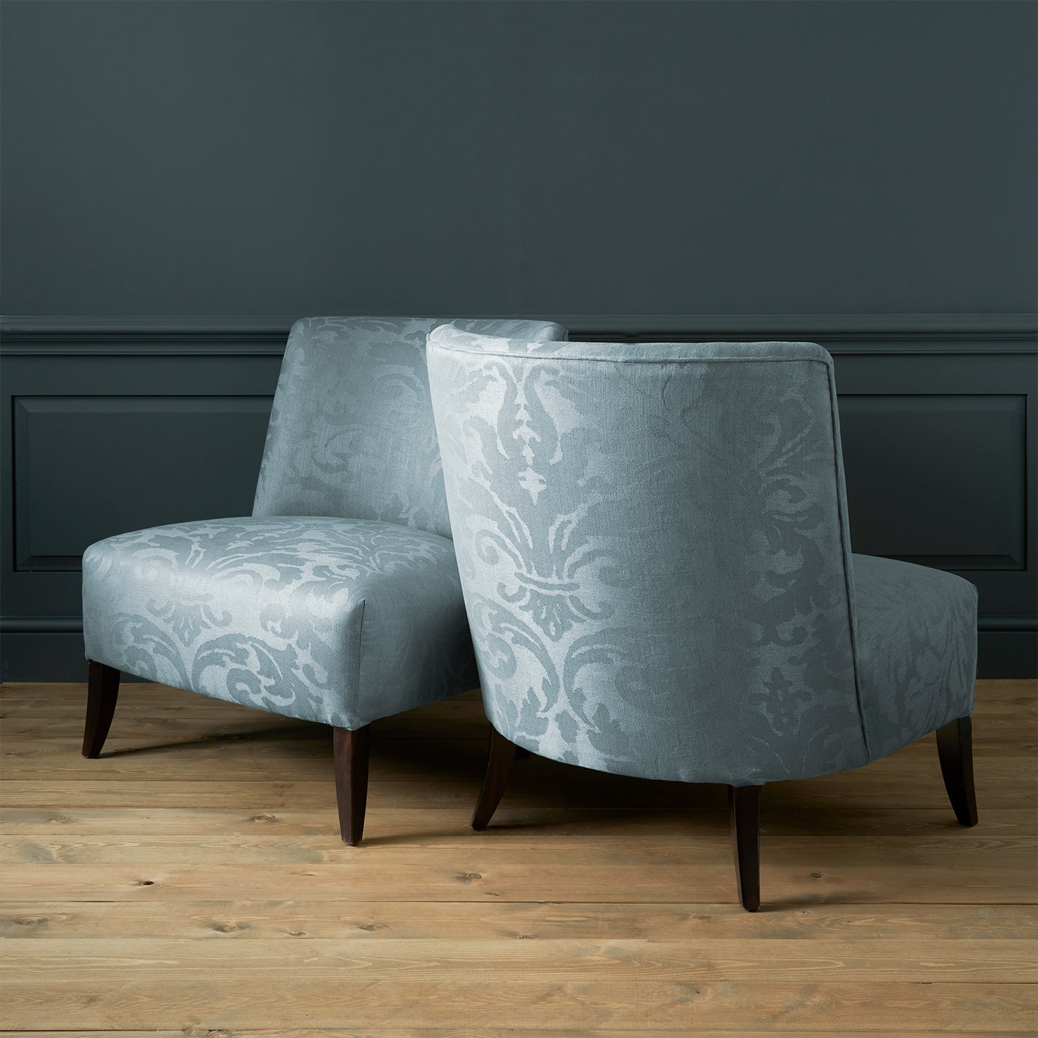 Armchairs in a contemporary damask fabric with blue colours.