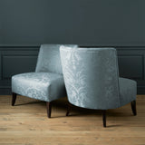 Armchairs in a contemporary damask fabric with blue colours.