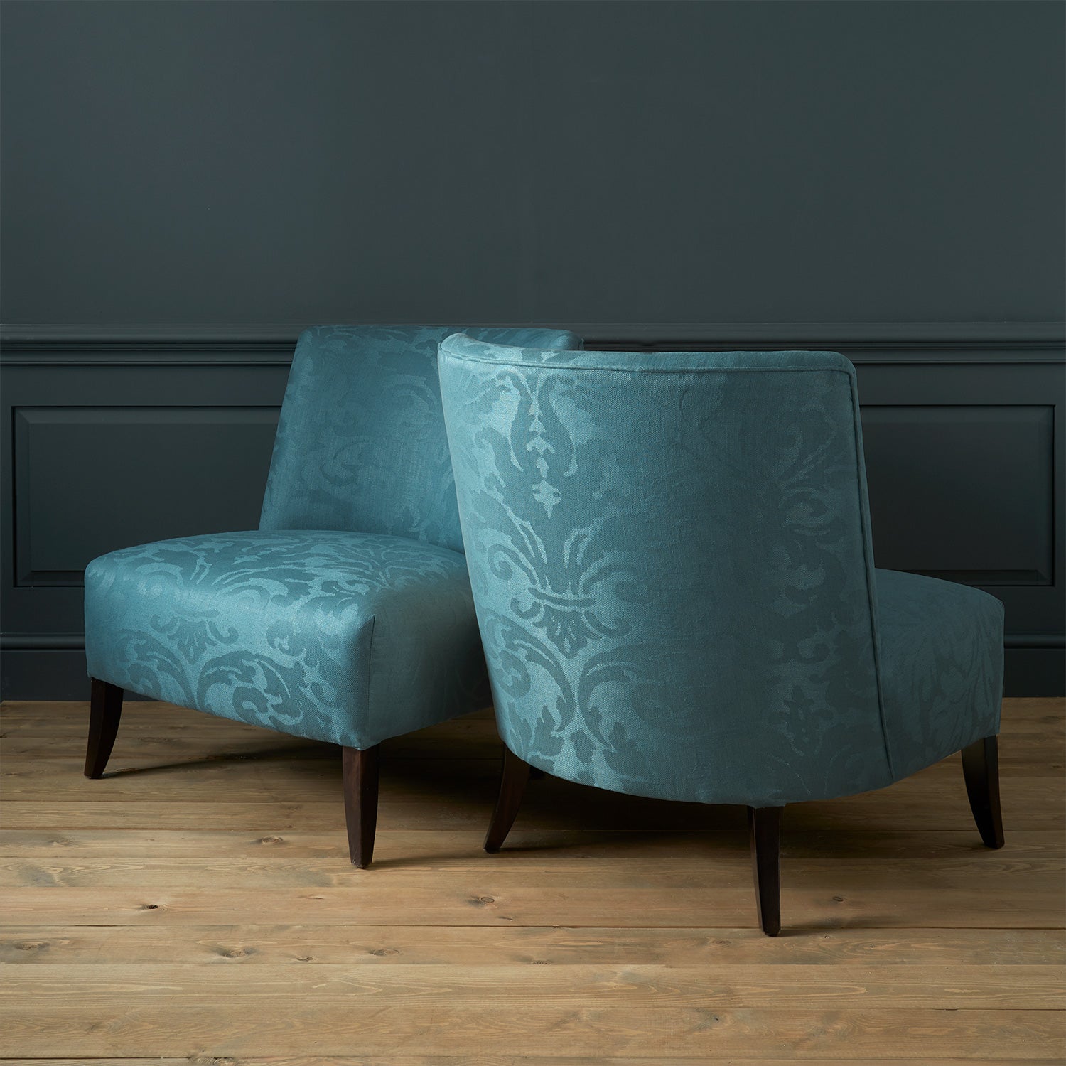 Armchairs in a contemporary damask fabric with blue colours.