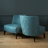 Armchairs in a contemporary damask fabric with blue colours.