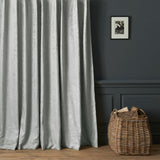 Curtains in a contemporary damask fabric with light cream colour.