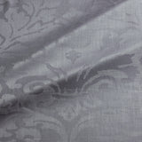 Fabric swatch of a contemporary damask fabric in a grey colour for upholstery and curtains.
