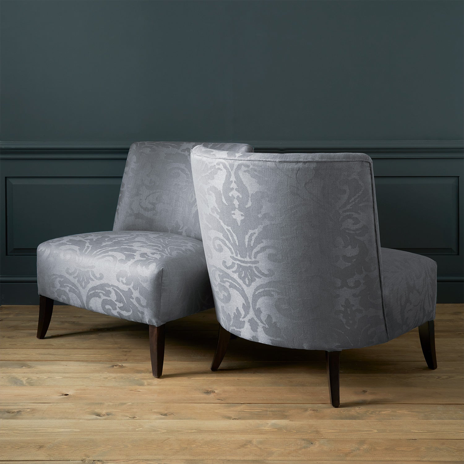 Armchairs in a contemporary damask fabric with grey colours.