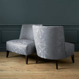 Armchairs in a contemporary damask fabric with grey colours.