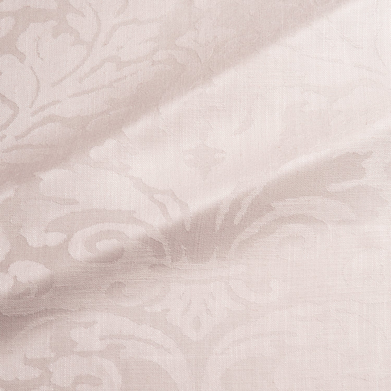 Fabric swatch of a contemporary damask fabric in a light pink colour for upholstery and curtains.