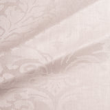 Fabric swatch of a contemporary damask fabric in a light pink colour for upholstery and curtains.