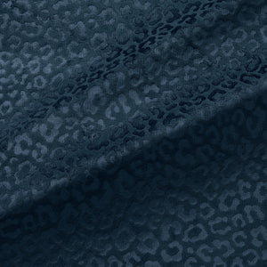 Fabric swatch of a blue stain resistant velvet animal print fabric, suitable for curtains and upholstery 