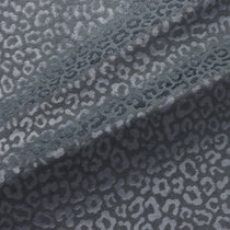 Fabric swatch of a blue stain resistant velvet animal print fabric, suitable for curtains and upholstery 