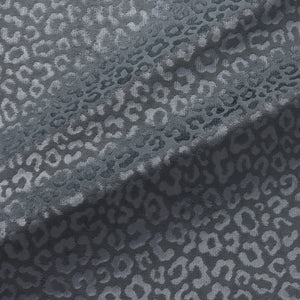 Fabric swatch of a blue stain resistant velvet animal print fabric, suitable for curtains and upholstery 