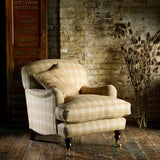 Chair upholstered in a beige Scottish wool plaid check fabric