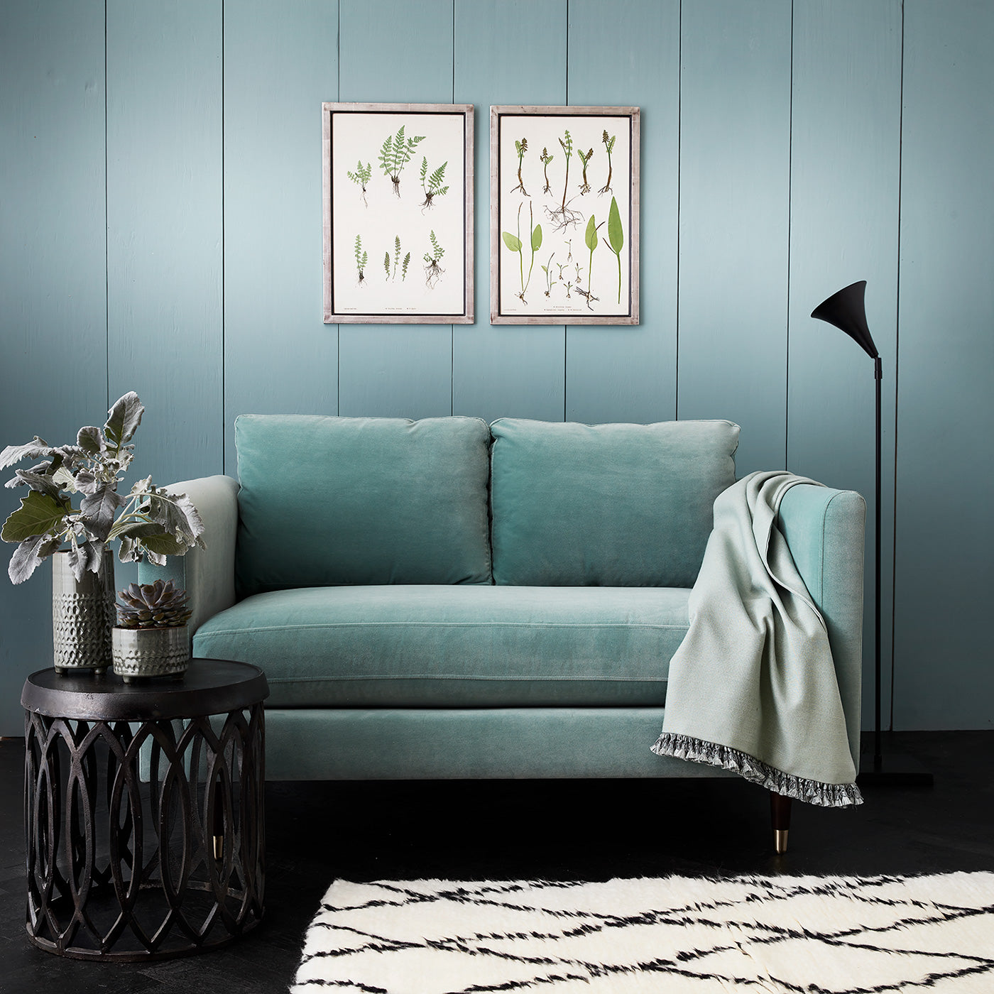 Blue eco velvet upholstery fabric on a sofa