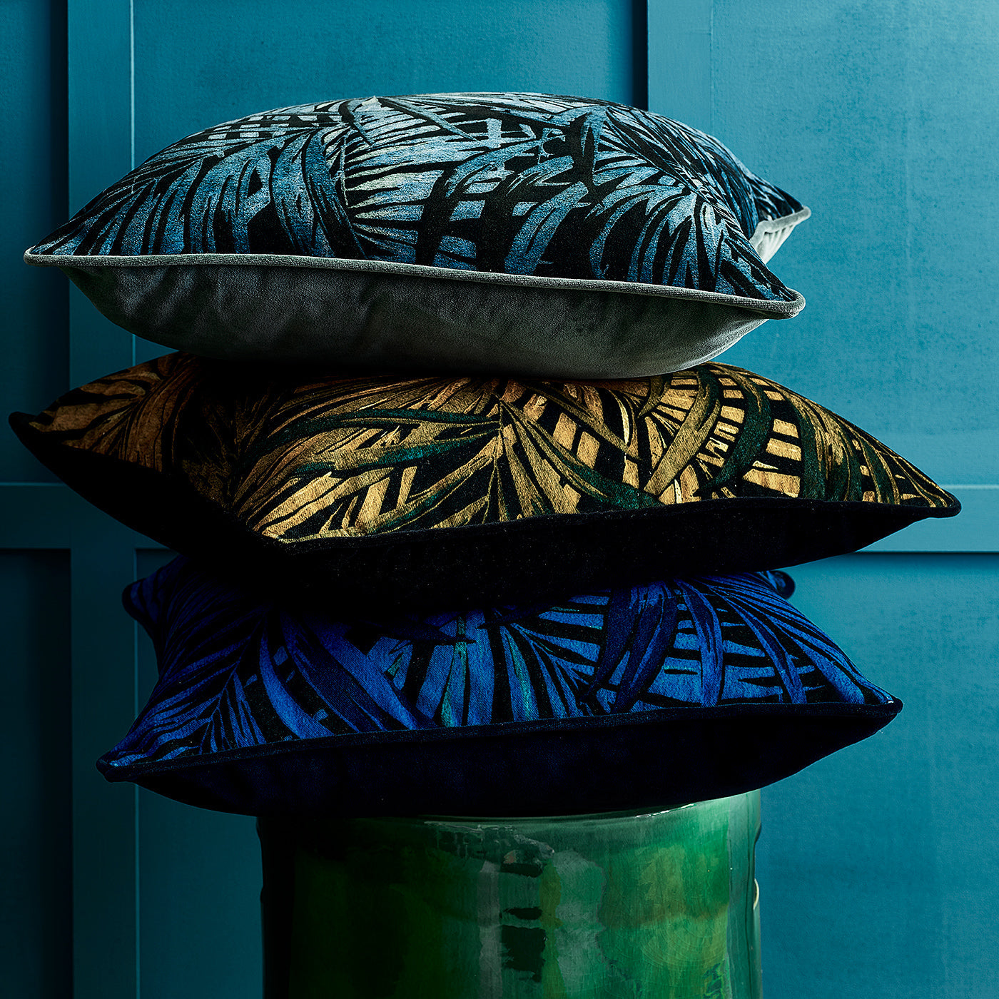 Patterned velvet cushions.